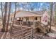 Charming one-story home with a porch and American flag at 11745 Stokes Ferry Rd, Gold Hill, NC 28071