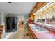 Galley kitchen with double sink and wood cabinets at 11745 Stokes Ferry Rd, Gold Hill, NC 28071