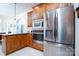 Modern kitchen with stainless steel appliances and a large island at 119 Barton Pl, Mooresville, NC 28117