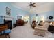 Living room with fireplace, hardwood floors and comfortable seating at 119 Barton Pl, Mooresville, NC 28117