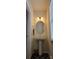 Powder room features a pedestal sink, mirror, and modern lighting at 121 Mackinac Dr, Mooresville, NC 28117