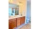 Bathroom featuring double sink vanity with tub and shower at 121 Mackinac Dr, Mooresville, NC 28117