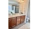 Bathroom featuring double vanity, glass shower, garden tub, and tile floor at 121 Mackinac Dr, Mooresville, NC 28117