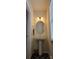 Half bathroom showcasing a pedestal sink, an oval mirror, and a modern light fixture at 121 Mackinac Dr, Mooresville, NC 28117