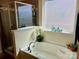 Serene bathroom featuring a deep soaking tub and a separate tiled shower, designed for relaxation at 121 Mackinac Dr, Mooresville, NC 28117