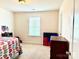 Bright and airy bedroom featuring carpet floors, neutral walls and furniture at 121 Mackinac Dr, Mooresville, NC 28117