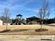 Community playground featuring play structures with slides, and a covered picnic area for residents at 121 Mackinac Dr, Mooresville, NC 28117