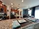Open concept kitchen with granite countertops, stainless steel appliances, and a breakfast bar at 121 Mackinac Dr, Mooresville, NC 28117
