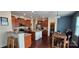 Spacious kitchen featuring an island, stainless steel appliances, and warm wood cabinetry at 121 Mackinac Dr, Mooresville, NC 28117