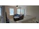 Cozy living room featuring a plush sectional sofa with a view from the second story at 121 Mackinac Dr, Mooresville, NC 28117