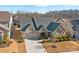 House with a two-car garage and landscaped yard, viewed from above at 12904 Vermillion Xing, Huntersville, NC 28078