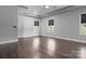 Large bedroom with hardwood floors and ceiling fan at 12904 Vermillion Xing, Huntersville, NC 28078