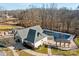 Aerial view showing community pool and clubhouse at 12904 Vermillion Xing, Huntersville, NC 28078