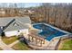 Community pool with covered seating area at 12904 Vermillion Xing, Huntersville, NC 28078