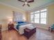 Charming bedroom with light walls and a lake view at 168 Tanglewood Cv, Belmont, NC 28012