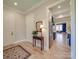 Bright entryway with hardwood floors and view of kitchen at 168 Tanglewood Cv, Belmont, NC 28012