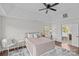 Main bedroom with ensuite bathroom access and hardwood floors at 2050 Stoney Creek Nw Dr, Concord, NC 28027