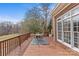 Deck with bistro table and chairs overlooking backyard at 2050 Stoney Creek Nw Dr, Concord, NC 28027