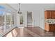 Sunlit dining area near kitchen with access to backyard at 2050 Stoney Creek Nw Dr, Concord, NC 28027