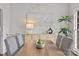 Elegant dining room, featuring hardwood floors and a chandelier at 2050 Stoney Creek Nw Dr, Concord, NC 28027