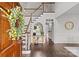 Two-story foyer with hardwood floors and a staircase at 2050 Stoney Creek Nw Dr, Concord, NC 28027