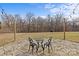 Stone patio featuring an outdoor seating area with view of trees and sky at 2050 Stoney Creek Nw Dr, Concord, NC 28027