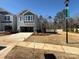 Two-story home with gray siding, attached garage, and landscaped lawn at 208 Laura Elizabeth Ln, Clover, SC 29710