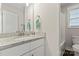 Bathroom with granite countertop, sink, and bathtub at 209 S Gregory St, Lancaster, SC 29720