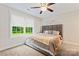 Large bedroom with a king-size bed and plenty of natural light at 209 S Gregory St, Lancaster, SC 29720