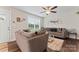 Spacious living room featuring two sofas and a coffee table at 209 S Gregory St, Lancaster, SC 29720