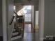 Spacious living room featuring a stone fireplace and many windows at 2327 Axford Ln, Matthews, NC 28105