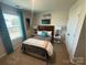 Cozy bedroom with a queen-size bed and nightstands at 252 Laura Elizabeth Ln, Clover, SC 29710