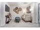 Cozy living room featuring neutral walls, carpet, and an entertainment console at 252 Laura Elizabeth Ln, Clover, SC 29710