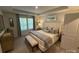 Large main bedroom with king-size bed and bench at 252 Laura Elizabeth Ln, Clover, SC 29710