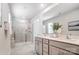 Modern bathroom with double vanity, a large mirror, and glass enclosed shower at 260 Laura Elizabeth Ln, Clover, SC 29710