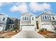 Charming exterior featuring a white garage door, neutral siding, and well-manicured landscaping at 260 Laura Elizabeth Ln, Clover, SC 29710