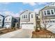 Inviting exterior with a white garage, neutral siding, and attractive landscaping at 260 Laura Elizabeth Ln, Clover, SC 29710