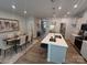 Dining area with hardwood floors and modern light fixtures at 268 Laura Elizabeth Ln, Clover, SC 29710