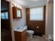 Bathroom featuring a single sink vanity, a toilet, and tiled floors at 2905 Maryland Ave, Kannapolis, NC 28083