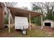 Carport features an RV, with a storage building in the backyard at 2905 Maryland Ave, Kannapolis, NC 28083