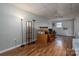 Spacious basement with wood flooring and an exposed ceiling at 298 Upper Stanley Rd, Stanley, NC 28164