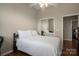 Cozy bedroom with ceiling fan, and mirror closet doors at 298 Upper Stanley Rd, Stanley, NC 28164