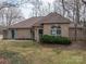 Charming brick home with a well-manicured lawn and mature landscaping creating a welcoming atmosphere at 298 Upper Stanley Rd, Stanley, NC 28164