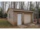 Brick garage with overhead door and service entry provides extra storage space at 298 Upper Stanley Rd, Stanley, NC 28164