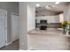 A cozy kitchen area featuring white cabinets and stainless steel appliances at 298 Upper Stanley Rd, Stanley, NC 28164