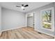 Bedroom with light grey walls and wood-look flooring at 3013 Southampton Cir, Gastonia, NC 28056