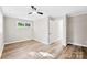 Bright bedroom featuring light walls and wood-look flooring at 3013 Southampton Cir, Gastonia, NC 28056