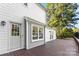 Back deck with grey siding and a wooden deck at 3013 Southampton Cir, Gastonia, NC 28056