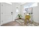 Well lit home office with modern desk, stylish rug, and bright windows at 3038 Finchborough Ct # 234, Charlotte, NC 28269
