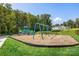 Bright and colorful community playground with swings and climbing equipment, perfect for to enjoy at 3038 Finchborough Ct # 234, Charlotte, NC 28269